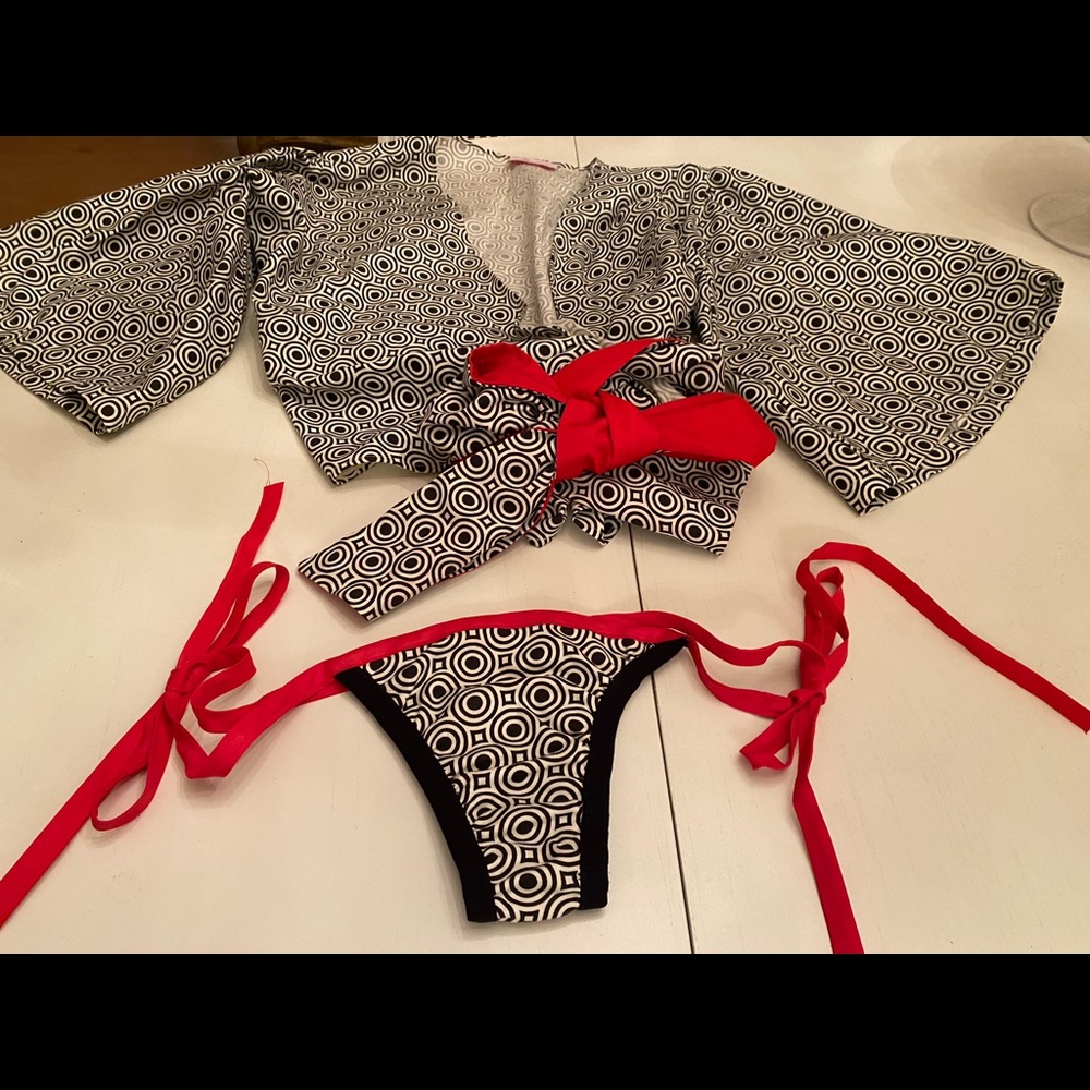 Two piece bikini set with a puff sleeve top. Only for the daring at heart.